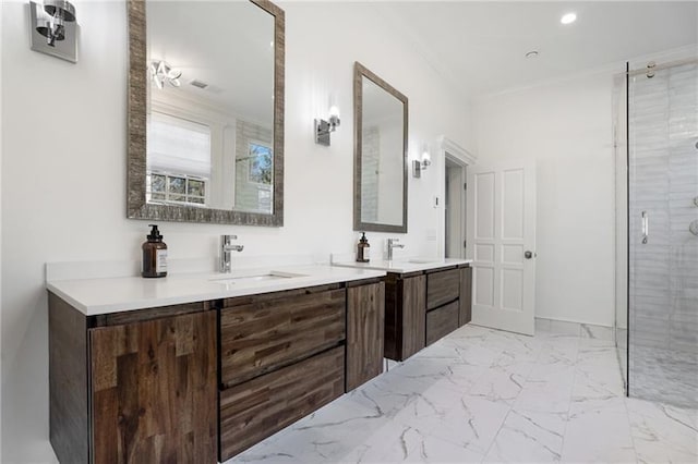 bathroom with tile patterned flooring, a shower with door, crown molding, and dual bowl vanity