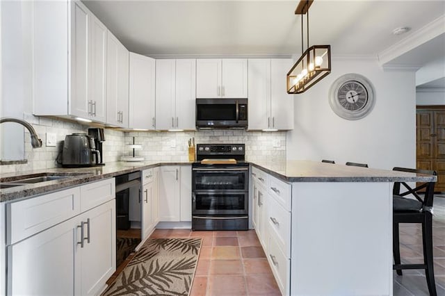 kitchen featuring dark stone countertops, decorative backsplash, light tile patterned floors, range with electric stovetop, and white cabinets