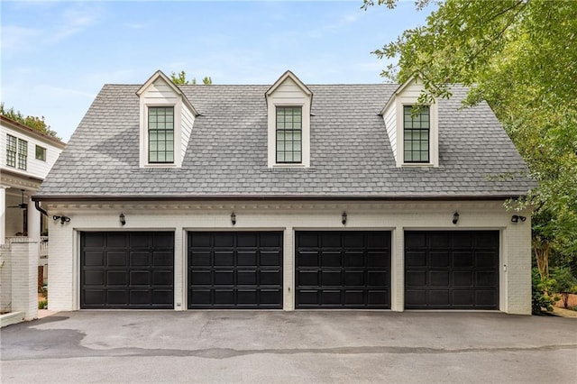 exterior space with a garage