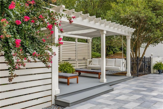 view of patio with an outdoor living space and a pergola