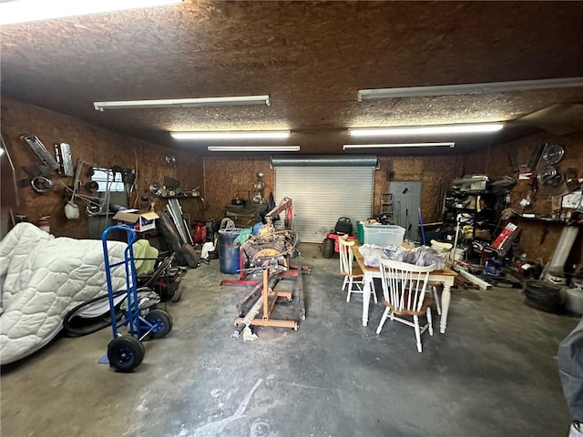 garage with wood walls