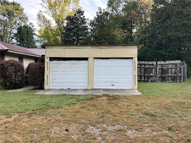 garage with a lawn