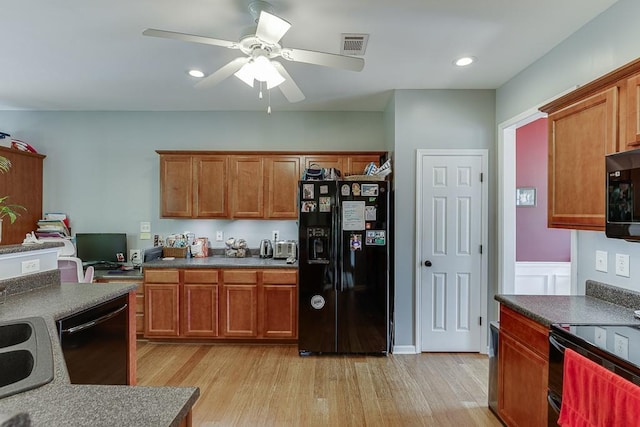 kitchen featuring black appliances, a ceiling fan, light wood-style floors, brown cabinets, and recessed lighting