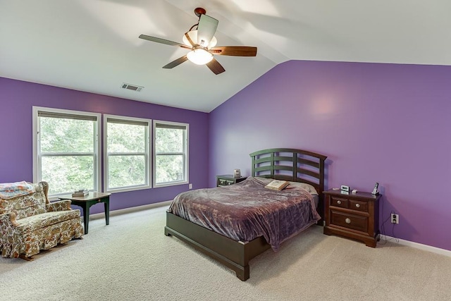 bedroom featuring carpet, lofted ceiling, ceiling fan, and baseboards