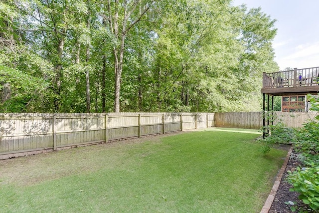 view of yard with a deck