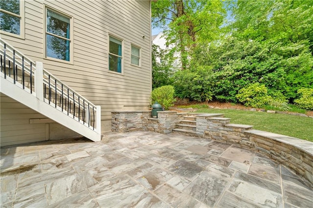 view of patio with stairway