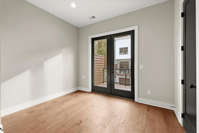 2329 Mason Dr Unit D24, Atlanta, GA 30316 - spare room with baseboards, french doors, wood finished floors, and recessed lighting
