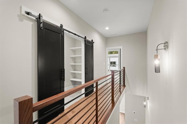 2329 Mason Dr Unit D24, Atlanta, GA 30316 - hallway with a barn door, an upstairs landing, and recessed lighting