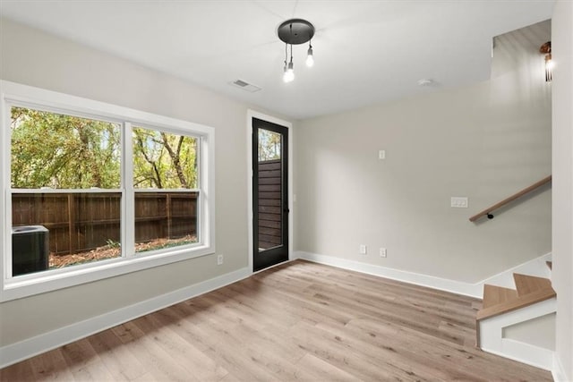 2329 Mason Dr Unit D24, Atlanta, GA 30316 - foyer entrance with wood finished floors, stairs, and baseboards