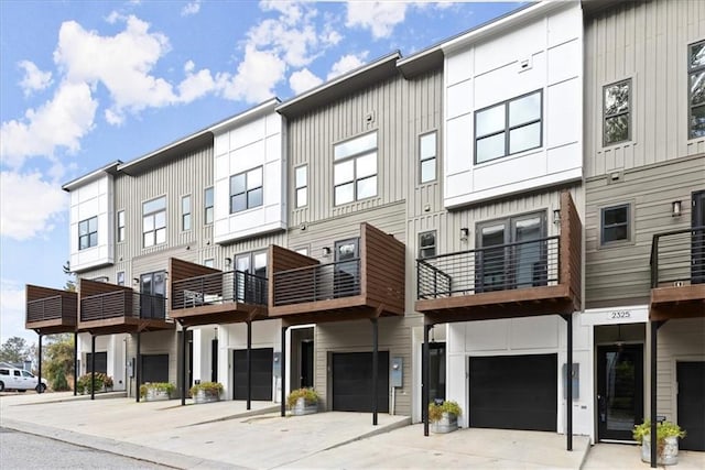 2329 Mason Dr Unit D24, Atlanta, GA 30316 - view of building exterior featuring an attached garage and driveway