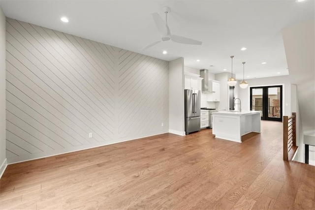 2329 Mason Dr Unit D24, Atlanta, GA 30316 - unfurnished living room featuring baseboards, light wood finished floors, ceiling fan, a sink, and recessed lighting