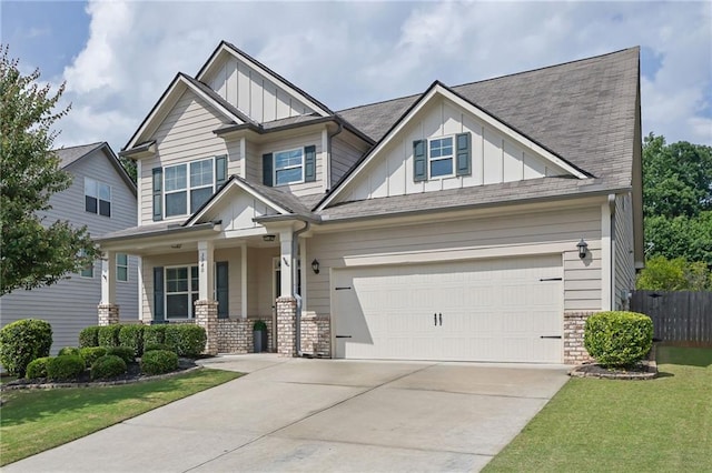 3940 Frasier Dr, Cumming, GA 30028 - craftsman inspired home with board and batten siding, driveway, a porch, and roof with shingles