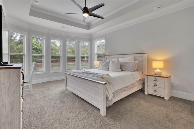 3940 Frasier Dr, Cumming, GA 30028 - bedroom featuring a tray ceiling, ornamental molding, carpet, and a ceiling fan