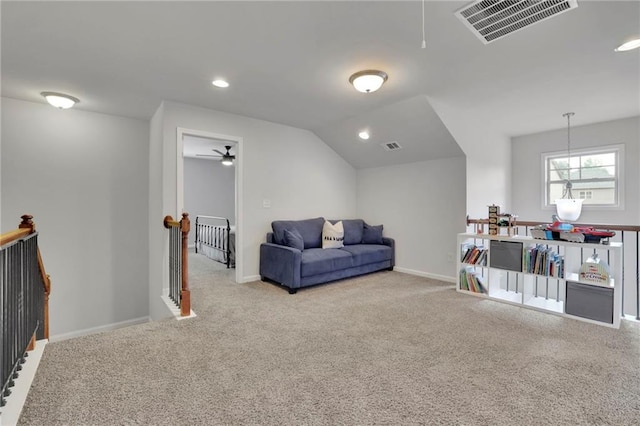 3940 Frasier Dr, Cumming, GA 30028 - living area featuring an upstairs landing, carpet flooring, recessed lighting, attic access, and vaulted ceiling