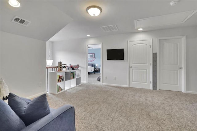 3940 Frasier Dr, Cumming, GA 30028 - carpeted living room with attic access and recessed lighting