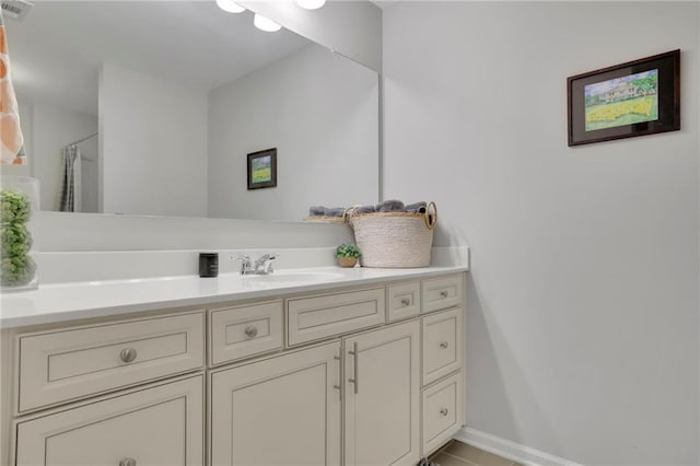 3940 Frasier Dr, Cumming, GA 30028 - bathroom featuring vanity and tile patterned floors
