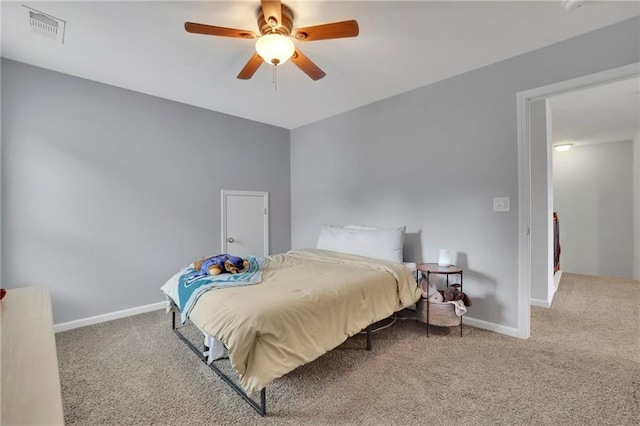 3940 Frasier Dr, Cumming, GA 30028 - carpeted bedroom featuring baseboards and ceiling fan
