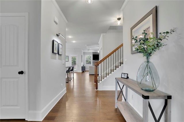 3940 Frasier Dr, Cumming, GA 30028 - foyer with stairs, wood finished floors, crown molding, and recessed lighting