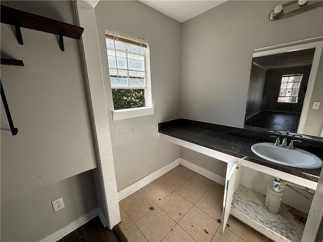 bathroom featuring tile patterned floors and sink