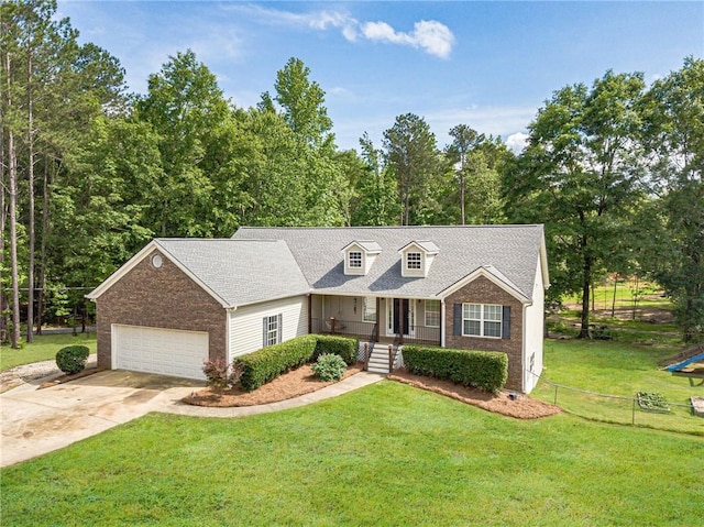 1623 Pratt Rd, Covington, GA 30014 - new england style home with brick siding, driveway, an attached garage, and a shingled roof