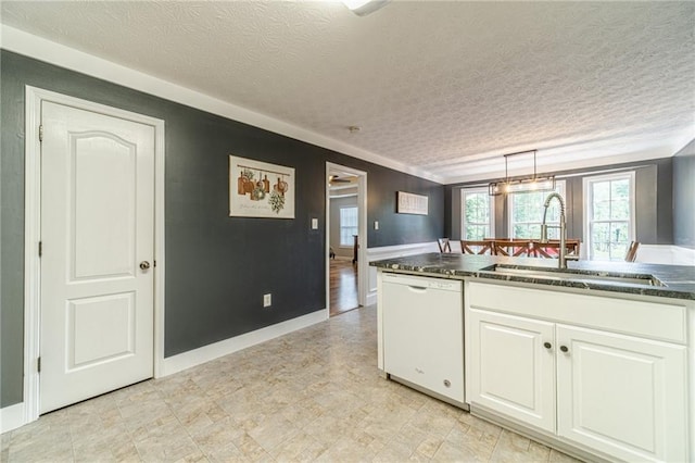 1623 Pratt Rd, Covington, GA 30014 - kitchen with dishwasher, a textured ceiling, white cabinets, hanging light fixtures, and dark stone countertops