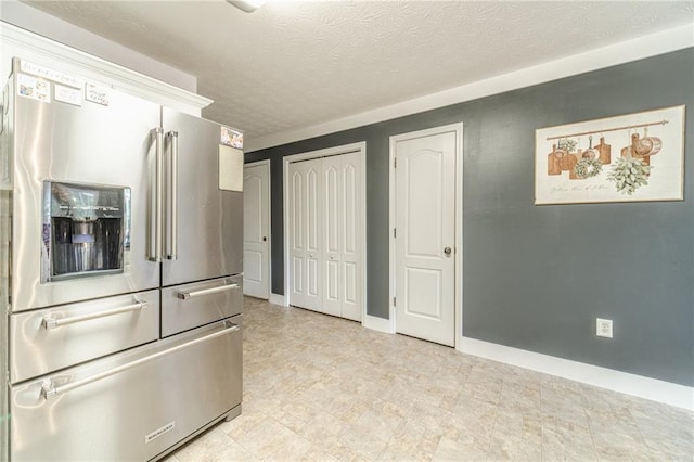 1623 Pratt Rd, Covington, GA 30014 - kitchen featuring high end refrigerator and a textured ceiling