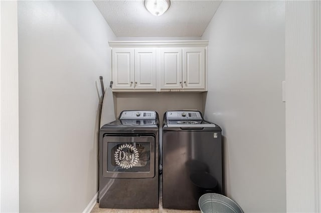 1623 Pratt Rd, Covington, GA 30014 - laundry area featuring separate washer and dryer and cabinet space