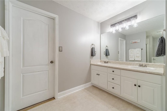 1623 Pratt Rd, Covington, GA 30014 - full bath with double vanity and a textured ceiling