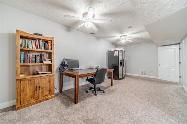 1623 Pratt Rd, Covington, GA 30014 - office with a textured ceiling, ceiling fan, and light carpet