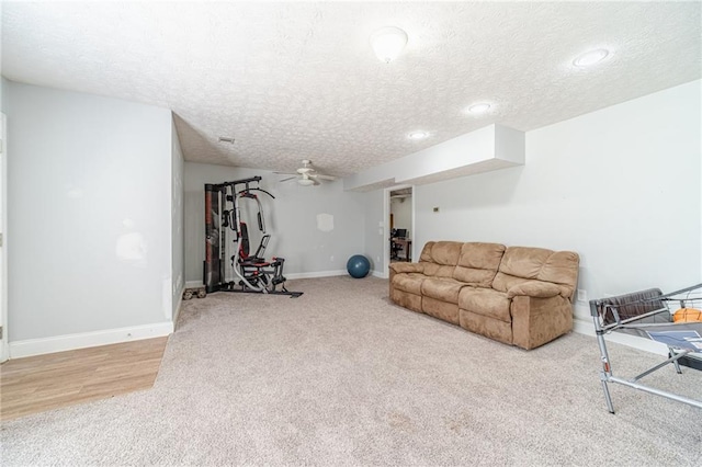 1623 Pratt Rd, Covington, GA 30014 - exercise area featuring carpet flooring, a textured ceiling, and a ceiling fan