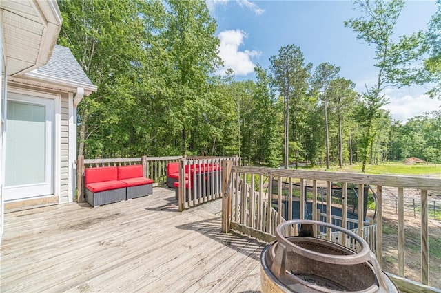 1623 Pratt Rd, Covington, GA 30014 - wooden deck with an outdoor living space