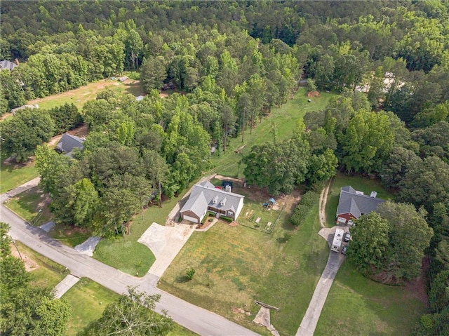 1623 Pratt Rd, Covington, GA 30014 - aerial view of property and surrounding area featuring a heavily wooded area