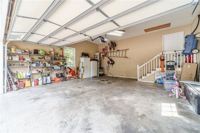 1623 Pratt Rd, Covington, GA 30014 - garage featuring a garage door opener