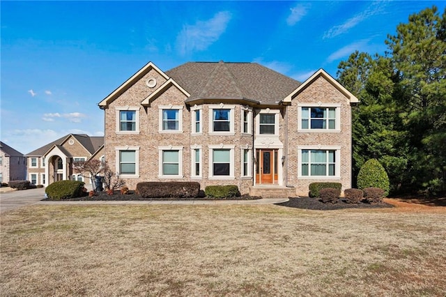 view of front of house with a front lawn