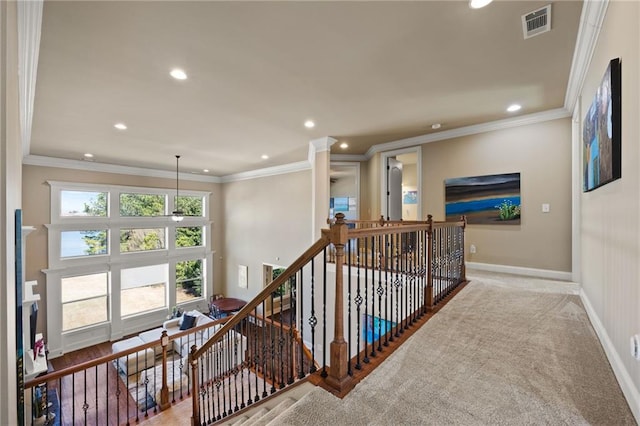 hall featuring light carpet and ornamental molding