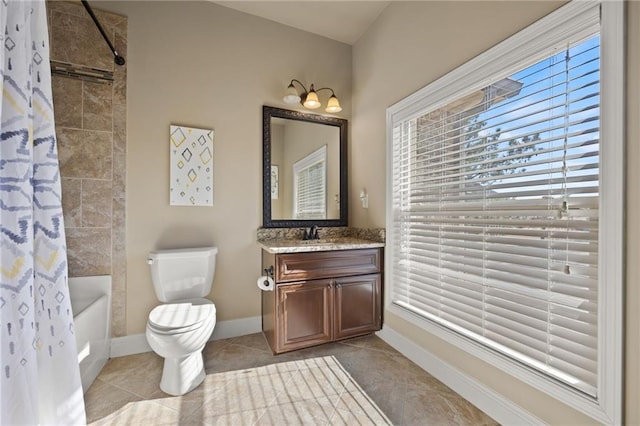 full bathroom with shower / tub combo with curtain, tile patterned floors, toilet, vanity, and a wealth of natural light