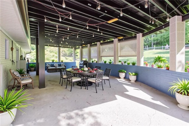 sunroom with an outdoor hangout area