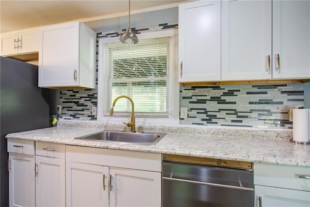 kitchen featuring a sink, white cabinetry, dishwasher, decorative backsplash, and light stone counters