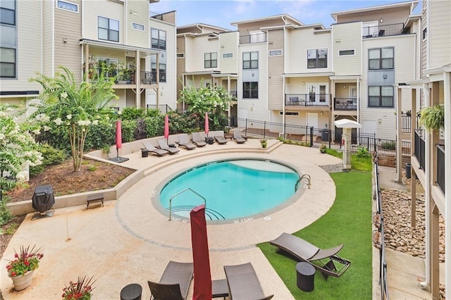 view of pool with a patio area