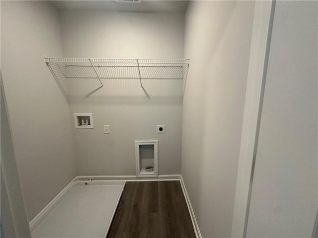 15 Fontana Ct, Covington, GA 30016 - washroom featuring hookup for an electric dryer, hookup for a washing machine, and dark wood-type flooring