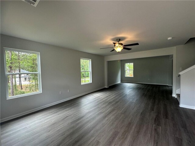 15 Fontana Ct, Covington, GA 30016 - spare room featuring ceiling fan and dark wood-type flooring