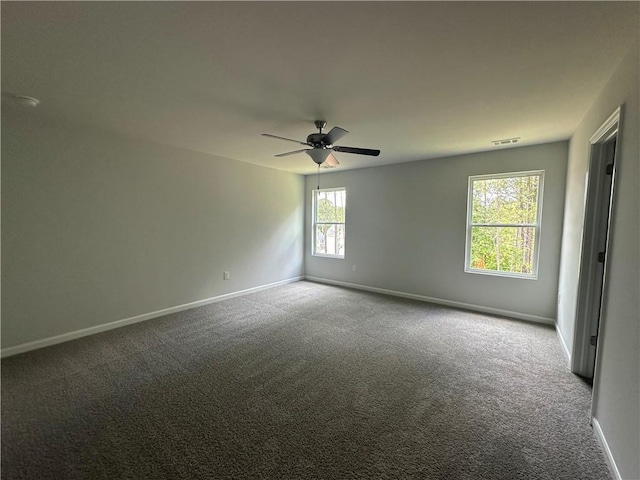 15 Fontana Ct, Covington, GA 30016 - carpeted spare room featuring baseboards and a ceiling fan