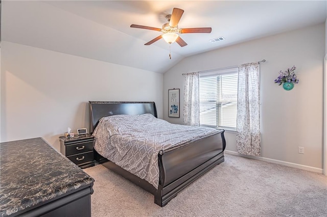 carpeted bedroom featuring lofted ceiling and ceiling fan