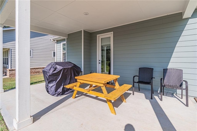 view of patio with a grill