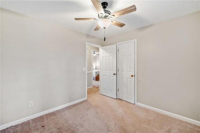 bathroom featuring a shower with curtain, vanity, toilet, and tile patterned floors