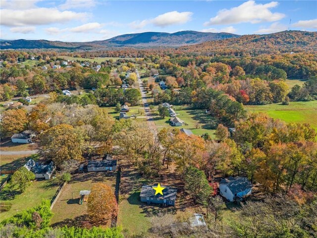 drone / aerial view featuring a mountain view