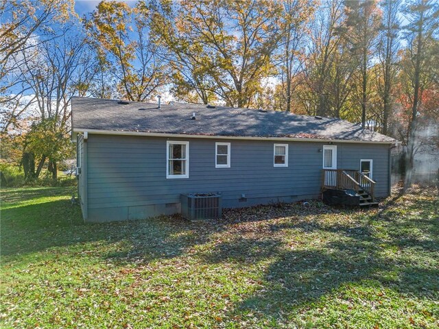 view of outbuilding featuring a yard