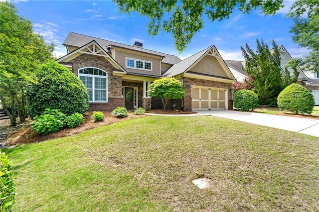 craftsman house with stone siding, an attached garage, driveway, a front yard, and a chimney