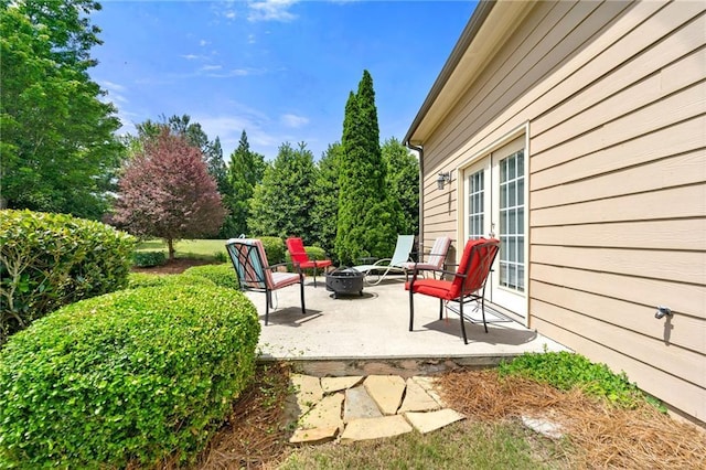 view of patio featuring a fire pit