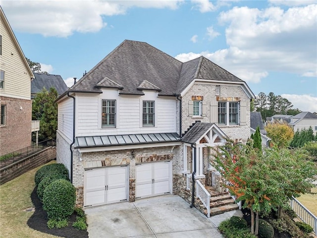 view of front of property with a garage